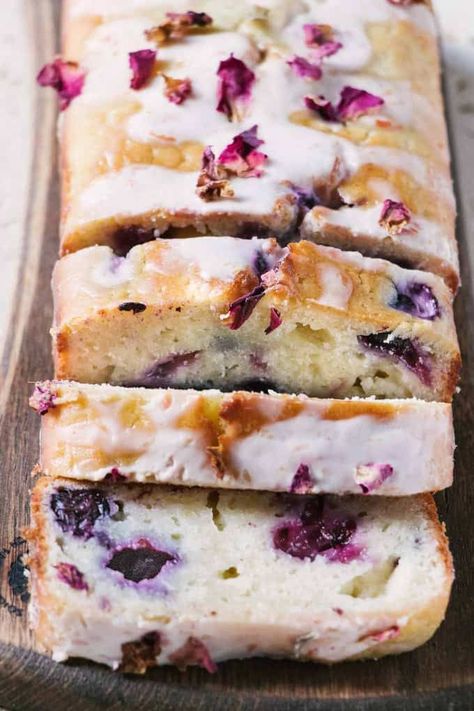 Juicy blueberries, tangly Greek yogurt and olive oil make this blueberry olive oil loaf cake a moist flavourful affair for anytime of day. Drizzled with a tangy citrus sugar glaze it's perfect with tea or coffee. Olive Oil Loaf Cake, Yogurt Loaf Cake, Blueberry Loaf Cakes, Orange Olive Oil, Blueberry Loaf, Blueberry Cake Recipes, Loaf Cake Recipes, Lemon Yogurt, Mini Tortillas