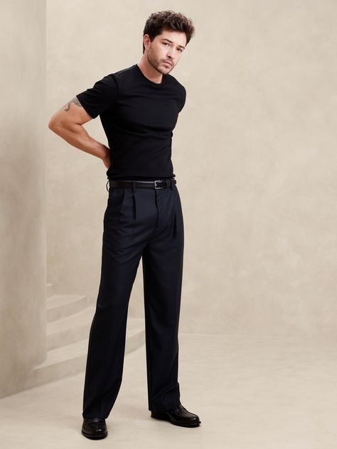 This relaxed pant is expertly cut with a wide leg and puddle hem in our signature Italian hopsack fabric, selected for its basketweave texture and exceptional drape.  Mid rise.  Wide leg with extra length for a break at the hem Fabric from Italy's Reda Mill.  Zip-fly with button closure.  Belt loops.  Four-pocket styling.  Wide-leg fit: High rise.  Tailored for the at-ease fit of traditional trousers, but with the extra wide-leg and full length of puddle-hem pants.  Wide leg opening measures 10" flat.  Inseams: Short 28. 5", Regular 30. 5", Tall 33. 5" Model: Size 32 Regular, 6'2" (188cm). Suit Pants And Shirt Men, Men Black Slacks Outfit, Men Formal Black Outfit, Men's Date Outfit, Sicilian Mens Style, Evening Mens Outfit, Mens Nice Outfit, Charleston Mens Fashion, All Black Style Men