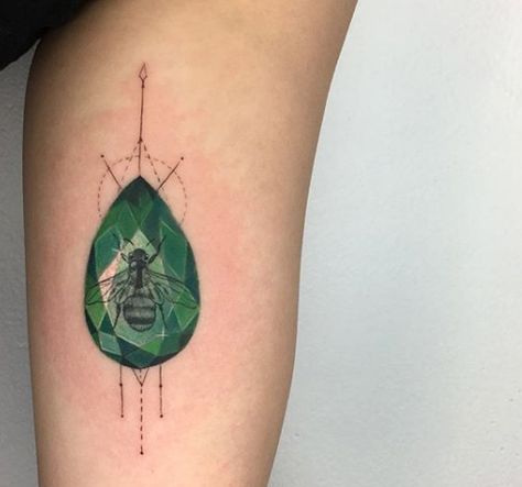 10 Stunning Crystal and Gem Tattoos - Tattoo.com Crystal Rock Tattoo, Geode Tattoo Ideas, Jade Stone Tattoo, Peridot Tattoo, Agate Tattoo, Gem Stone Tattoo, Jade Tattoo, Crystal Tattoos, Stone Tattoo