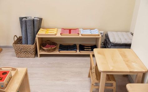 Looking to make your home Montessori-friendly, but not sure where to start? This room-by-room guide to Montessori furniture will get you started off in the right direction. Incorporating Montessori in The post Montessori Furniture: Creating An Empowering Environment For Childhood Learning appeared first on Mama's Must Haves. Bed On The Floor, Montessori Trays, Playroom Shelves, Cbt Therapy, Low Dresser, Montessori Furniture, Hebrew Israelite, Montessori School, Activity Table