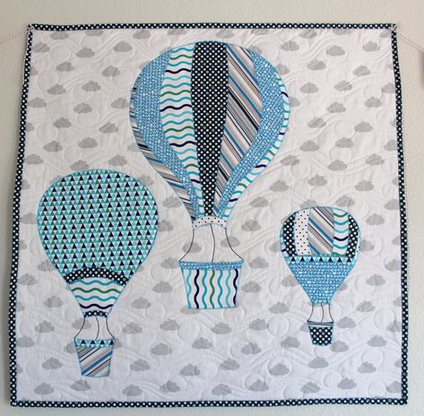 This pattern includes three separate pdf documents, one for each balloon: a small balloon pattern, a medium balloon pattern, and a large balloon pattern. Each piece of the pattern is intended to be cut out and then pinned onto your fabric, then cut out and pieced together, typically using iron-on adhesive. This pattern does not include any further directions as to how the quilt should be pieced together. The quilt pictured for this pattern is 2.5ft x 2.5ft.  For more details regarding this patte Hot Air Balloon Quilt, Balloon Quilt, Balloon Pattern, Wall Hanging Pattern, Small Balloons, Baby Quilt Patterns, Large Balloons, Picture Quilts, Boy Quilts