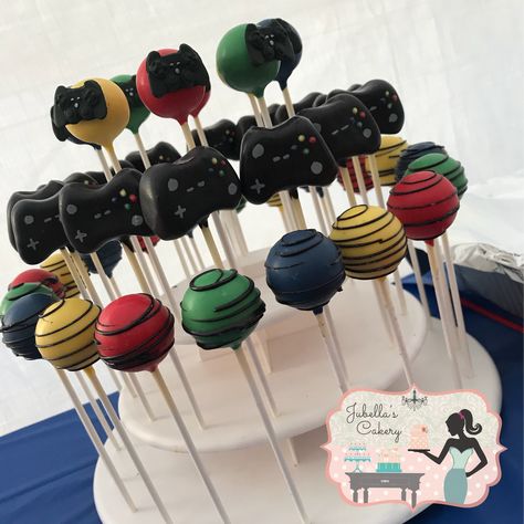 Cake Pops for a video game themed party Gaming Treat Ideas, Gamer Party Treats, Gaming Cake Pops, Ps5 Party Theme, Gamer Cake Pops, Video Game Cake Pops, Video Game Treats, Gamer Party Food, Video Games Cake