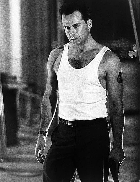 Bruce Willis as John McClane - Die Hard (1988) behind the scenes Die Hard 1988, John Mcclane, Hard Photo, White Vest, Lights Camera Action, Bruce Willis, Celebrity Beauty, Die Hard, Film Stills