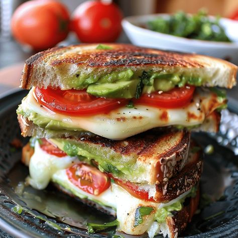 Try this delicious avocado, mozzarella, and tomato grilled cheese recipe for a quick, healthy, and satisfying meal. Healthy Recipes With Mozzarella Cheese, Contact Grill Recipes, Avocado Mozzarella Tomato Grilled Cheese, Tomato Grilled Cheese, Mozzarella And Tomato, Recipes With Mozzarella Cheese, Fancy Grilled Cheese, Avocado Salsa Recipe, Grilled Cheese Recipe