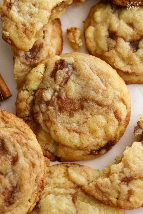 Closeup of cinnamon roll cookies on parchment paper. Cinnamon Roll Sugar Cookies, Cinnamon Sugar Cookies Recipe, Brown Sugar Cookie Recipe, Choc Mousse, Celebrating Sweets, Cinnamon Sugar Cookies, Cinnamon Roll Cookies, Trifle Bowl, Rolled Sugar Cookies