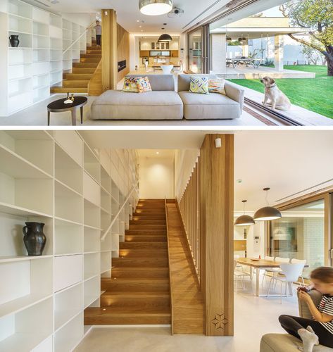 This modern house has wood stairs with a built-in slide for the kids in the family. #WoodStairs #ModernStairs #Slide Stairs And Slide In House, Stairs With A Slide, Slide In The House, Slide Next To Stairs, Built In Slide In House, Slide Inside House, Indoor Slide Stairs, Staircase With Slide, Stairs With Slide