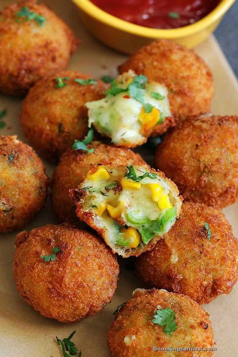 Easy to make and addictive, these Cheese corn balls are an ideal snack for kids as well as for adults. They are also perfect for parties, potlucks, get-togethers, and a true crowd-pleaser. They are soft from the inside and crispy from the outside. They are an absolute indulgence during the cold or rainy season. The best part is you can make a mixture and roll the ball, then store it in the fridge and deep fry within minutes whenever required and enjoy hot. #snacks #corn #cheeseballs #Kids Paneer Cheese Corn Balls, Corn Balls Fried, Cheese Corn Balls, Corn Balls Recipe, Cheese Corn Balls Recipe, Corn Ball, Corn Balls, Continental Food, Vegetarian Kids