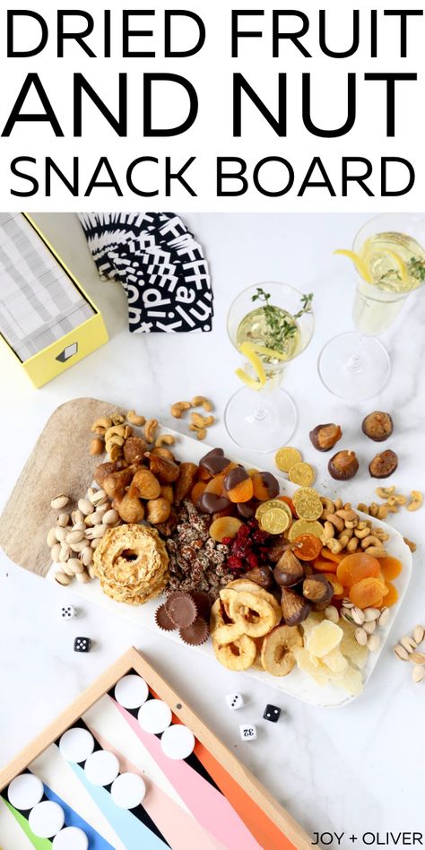 New Years Eve Dried Fruit and Snack Board made of a variety of sweet, salty, spicy and chocolate pairs perfectly with a game night in to end the year. This board makes the perfect appetizer for any holiday or gathering! #appetizer #cheeseboard #nuts #driedfruit Nut Board Ideas, Nut Tray Ideas, Chocolate Pairings, Non Perishable, Appetizer Trays, Nut Snacks, New Year's Eve Recipes, Easy Appetizers, Snack Board