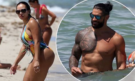 WWE star Roman Reigns shows off his buff physique while wife Galina Becker sizzles in swimsuit | Daily Mail Online Roman Reigns And Naomi, Roman Reigns And Galina Becker, Galina Becker, Reign Show, Roman Reigns Wife, Reign Hairstyles, Roman Reigns Family, Roman Reigns Wwe Champion, Roman Reigns Shirtless