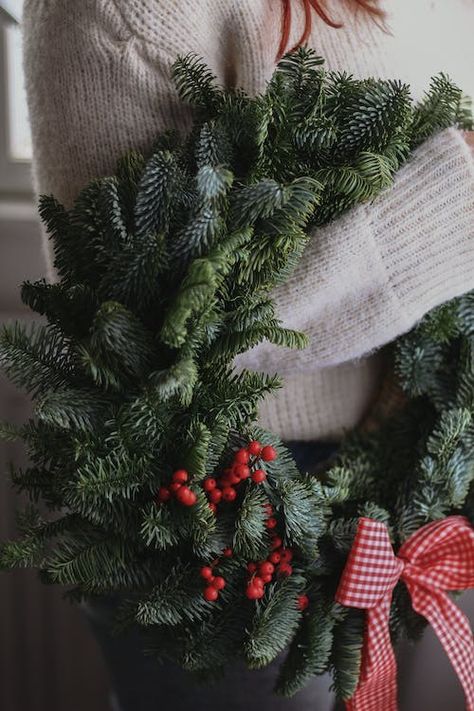 Person in Knitted Sweater Holding a Wreath · Free Stock Photo Advent Wreath Diy, Traditional Wreath, Advent Wreath, Navidad Diy, Nordic Christmas, Christmas Decorations For The Home, Christmas Wreaths Diy, Scandinavian Christmas, Christmas Images