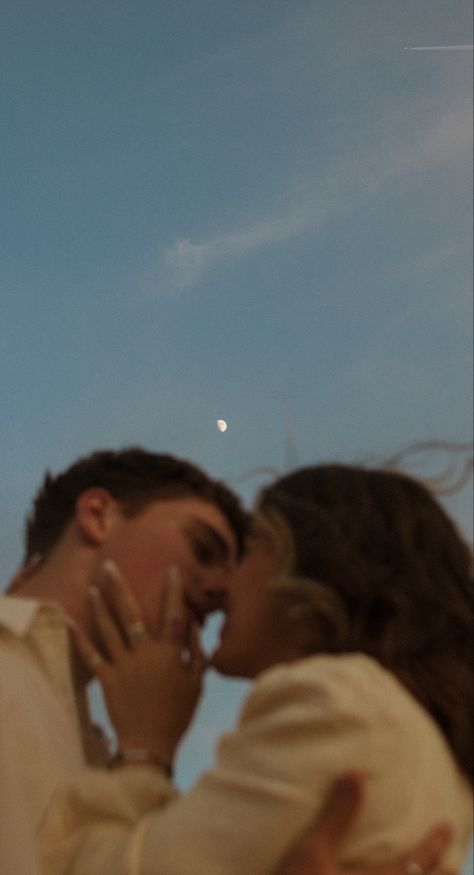 Blue sky, moon in the sky, Two people in love under the moon 
Lovers underneath the moon Watching Moon Together Aesthetic, Watching Moon Couples, Couple Watching Moon Together, Couple Watching Moon, Night Couple Photography, Lovers Poses, Pasandida Aurat, Lovers Photoshoot, Summer Couple Pictures