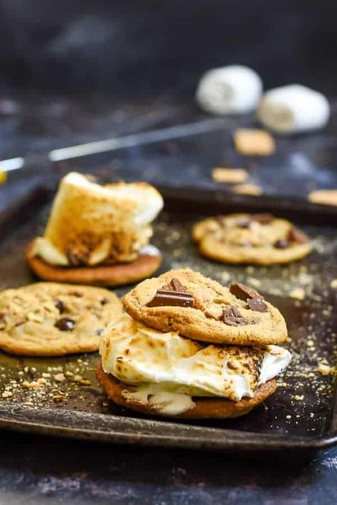 Graham Cracker Chocolate Chip Cookies with Toasted Marshmallows | NeighborFood Cracker Chocolate, Chocolate Chunk Cookie Recipe, Graham Cracker Recipes, Gooey Chocolate Chip Cookies, Camping Desserts, Chocolate Graham Crackers, Cheesecake Desserts, Chocolate Chunk Cookies, Toasted Marshmallow