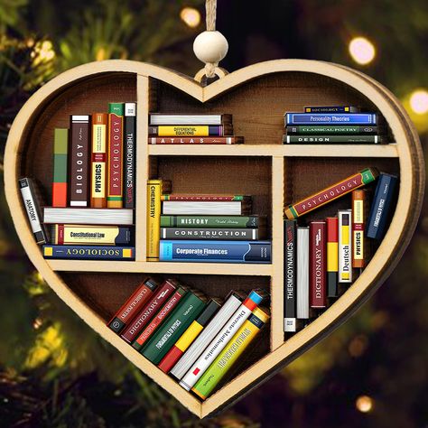 PRICES MAY VARY. PERFECT BOOK LOVERS GIFTS: Whether they're an avid reader, bookworm or just getting into books, this ornament will make them smile and feel your appreciation for their love of reading. Perfect for book enthusiasts. Small Gifts for people who like to read on Thanksgiving, Christmas, White Elephant, Book Day. 3D BOOKSHELF HEART ORNAMENTS FOR CHRISTMAS TREE: This Book Ornament is sure to keep your book lovers in the mood for happiness throughout the entire holiday season. This will Christmas Gifts For Readers Book Lovers, Homemade Gifts For Readers, Book Lover Ornament, Book Lover Gift Basket, Bookshelf Ornaments, Book Themed Party Decorations, Book Lovers Gift Basket, Christmas Tree Ornaments To Make, Book Related Gifts