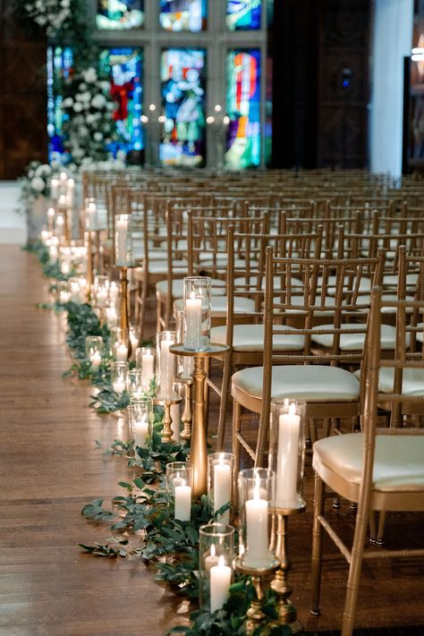 A lush and luxurious candlelit Kansas City wedding featuring opulent vines, open garden blooms, and timeless design. Photography by Ashley Ice Photography | Planning by Composure | Floral by Good Earth Floral | Signage by Nellie Sparkman | Venue at Hotel Kansas City Candle Wedding Aisle Decor, Wedding Aisle Flowers And Candles, Candle Aisle Wedding, Candles Wedding Aisle, Candle Lit Wedding Aisle, Candlelit Wedding Aisle, Candle Aisle Decor, Wedding Aisle Decorations Indoor, Candle Aisle