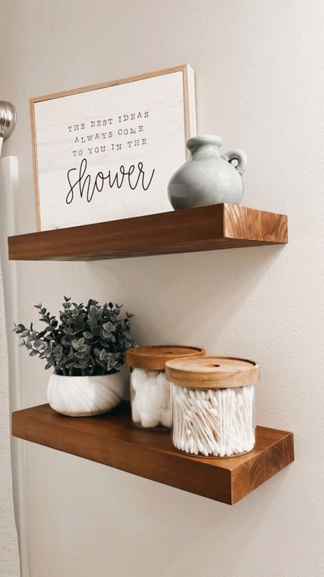 #bathroomdecor #walldecor #floatingshelves #woodshelves #homedecor #bathdecor Apartment Decorating Wood Theme, Bathroom Organization Vanity, Guest Bath Ideas Decor, Two Shelf Bathroom Decor, Guest Bath Shelf Decor, Cozy Clean Bathroom Ideas, Bathroom Decoration Inspiration, Hanging Shelf Bathroom, Neutral Tone Bathroom Ideas