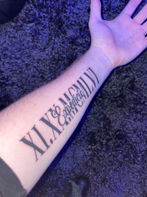 This tattoo is in dedication to my great grandparents. My great grandparents lived in Hungary during the Hungarian Revolution in 1956, and the roman numerals stand for the date that they left the country to travel around the get to a free country we call America. The word in the middle “Expedíció” means Expedition in Hungarian and shows the journey they had made to escape all the violence and to show how far they came to show their bravery and their courage to produce new life and new memories.. 10 Roman Numeral Tattoo, Forearm Roman Numeral Tattoo, Roman Numeral Tattoo Men Forearm, Colby Tattoo, Roman Numeral Tattoo Forearm, Name Tattoos For Men Forearm, Roman Numeral Tattoo Men, Roman Numeral Tattoo With Name, Roman Numeral Tattoo Arm