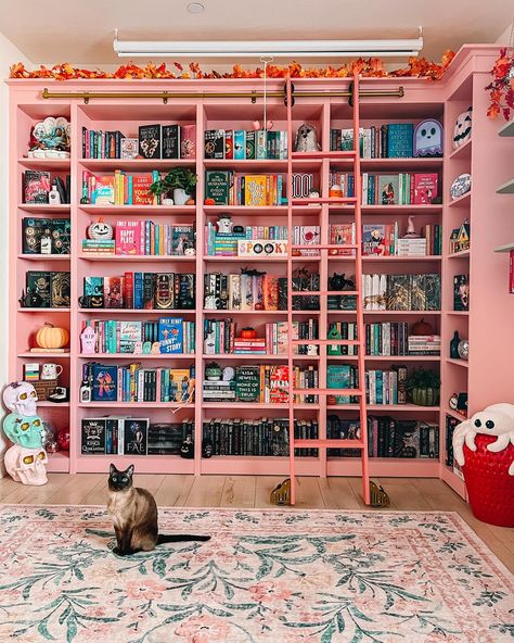 i don’t want to hear… a single.. word 🤫🤫🤫 first & foremost, not that i owe any explanations lol i just want to say that i did *not* paint my bookcases pink again for/bc of the grown ladies who were sending me hate mail & threatening to unfollow 💀 the green was beautiful & cozy & i loved it but from the beginning it just didn’t feel like ✨me✨ & after sitting w it for a few days i was really not feeling comfy w it SECOND if you really focus & pay attention to the color pink… it IS different ... Girly Library, Pink Bookcase, Grown Up Bedroom, Different House Styles, Hidden Spaces, Wardrobe With Dressing Table, Teenage Bedroom, Education Design, Pink Decor