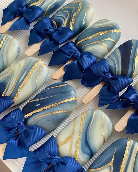 Blue And Gold Candy Buffet, Cake Pops Blue And Gold, Royal Blue And Gold Treats, Blue And Gold Cakesicles, Navy Blue And Gold Dessert Table, Blue And Gold Cookies, Graduation Cakesicles, Magnum Cake, Elegant Cake Pops