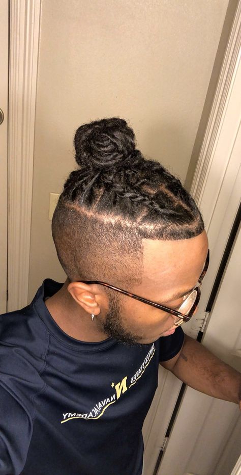 Braided dreadlocks with bun. Locs With Shaved Sides Men, Dread Men, Dreadlock Fade, Dreads Art, Lock Hairstyles, Man Braids, Bun Braids, Viking Hairstyles, Dread Hairstyles For Men