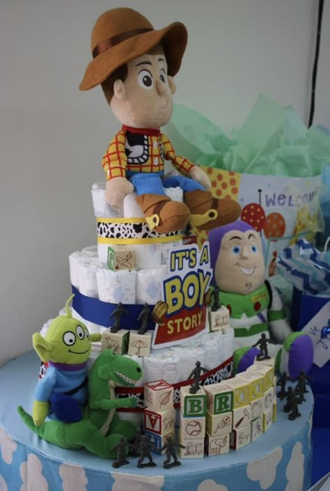 Boy Story Baby Shower Theme Centerpieces, Toy Story Diaper Cake Ideas, Boy Toy Story Baby Shower Theme, Boy Story Baby Shower Cake, Toy Story Themed Baby Shower (boy), Toy Story Baby Shower Games, Toy Story Diaper Cake, A Boy Story Baby Shower Ideas, Toy Story Baby Shower Cake