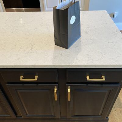 Snowbound Kitchen, Tricorn Black Island & White Duck Bathroom - 2 Cabinet Girls Tricorn Black Island, Black Kitchen Islands, Duck Bathroom, Tricorn Black, Gray Quartz, Black Island, Cherry Kitchen, White Duck, White Ducks