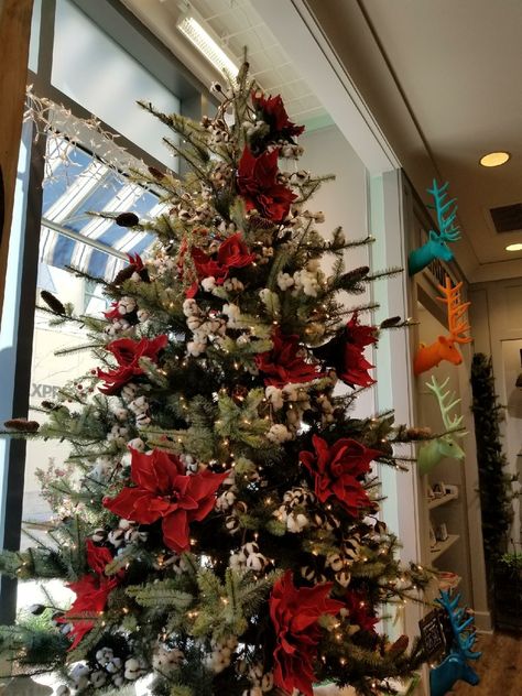 Poinsettia In Christmas Tree, Poinsettia On Christmas Tree, Poinsettia Christmas Tree Decorations, Red Poinsettia Christmas Tree, Christmas Tree With Poinsettia Flowers, Christmas Tree Poinsettia Decorations, Floral Arrangements For Church, Legend Of The Poinsettia, Poinsettia Christmas Tree