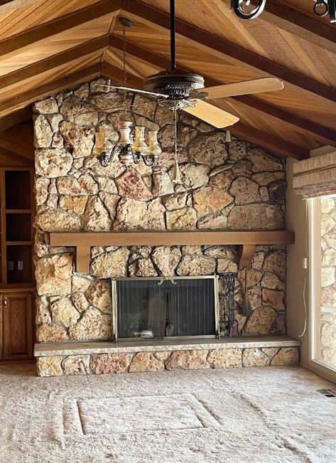 Our Limewashed White Rock Fireplace with Bleached Wood Mantle - Nesting With Grace Diy Mantle On Rock Fireplace, Mantle On Rock Fireplace, Rock Fireplace With Mantle, Limewash Rock Fireplace, White Rock Fireplace, Rock Fireplace Makeover, Painted Rock Fireplaces, Covered Hot Tub, Lava Rock Fireplace