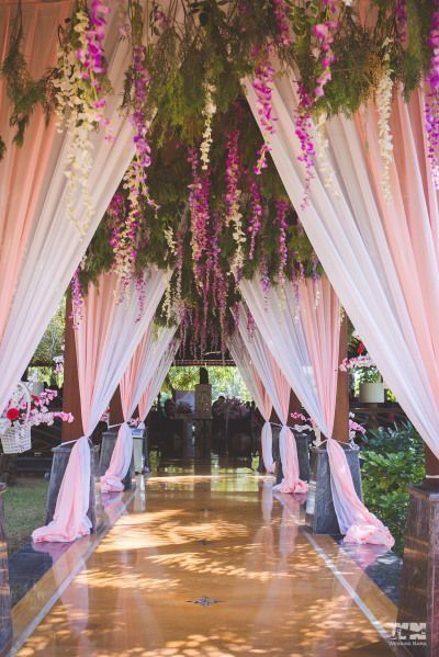 15+ Incredible Entry Walkways Into Your Wedding! | WedMeGood Wedding Reception Entrance, Budget Weddings, Reception Entrance, Wedding Hall Decorations, Wedding Reception Backdrop, Wedding Entrance Decor, Mandap Decor, Desi Wedding Decor, Beautiful Wedding Decorations