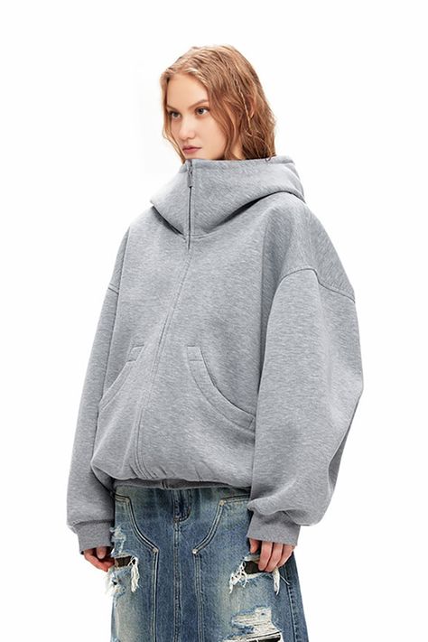 Oversized Comfort with Practical Details This grey zip-up hoodie features an oversized design for maximum comfort and style. Made from soft, thick fabric, it’s perfect for various occasions. The hood and front pockets add practicality and comfort. Pair with jeans or sweatpants for a casual, stylish look. Style #: WWAJ431 Large Hoodie Outfit, High Fashion Hoodie, Zip Up Hoodie Design, Big Jacket, Baggy Sleeves, Chic Fits, Oversized Zip Up Hoodie, Quirky Prints, Casual Activewear