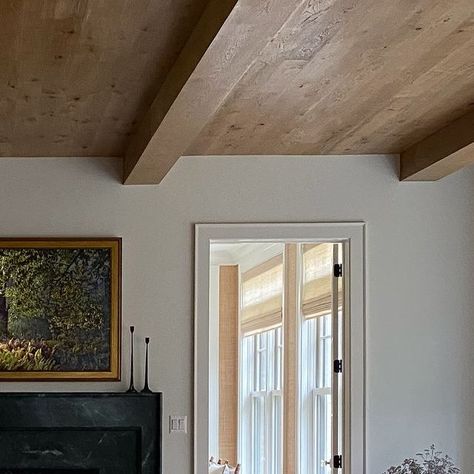 Liz Mearns Interior Designer on Instagram: "Wood paneling on the ceiling? Absolutely!  Adding wood to your ceiling can transform a room, bringing warmth, texture, and architectural interest to your space.  Wood ceilings create a cozy, inviting atmosphere and can make large rooms feel more intimate. They also add a natural element that complements various design styles, from rustic to modern.  When choosing wood for your ceiling, consider the type of wood, its finish, and how it complements your overall design. Lighter woods like pine or oak can brighten a room, while darker woods like walnut or mahogany add drama and elegance. Installation options are endless: exposed beams, beadboard, shiplap, or tongue-and-groove planks each offer unique looks.  So remember, one way to elevate your desig Interior Wood Paneling, Pitched Ceiling, Tongue And Groove Ceiling, Plank Ceiling, Ceiling Texture, Design Architect, Type Of Wood, Natural Element, Exposed Beams