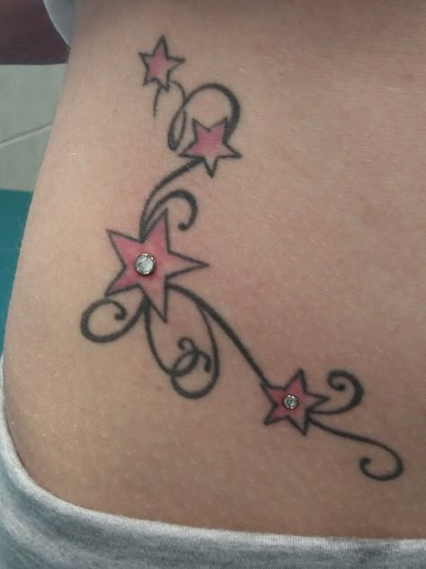 Star Tattoo Piercing Y2k Symbols Tattoo, Early 2000s Tattoos, Mcbling Tattoo, Tattoo Ideas Y2k, Y2k Tattoos, Piercing Combinations, Star Tattoo Ideas, Lower Back Tattoo, Emo Tattoos