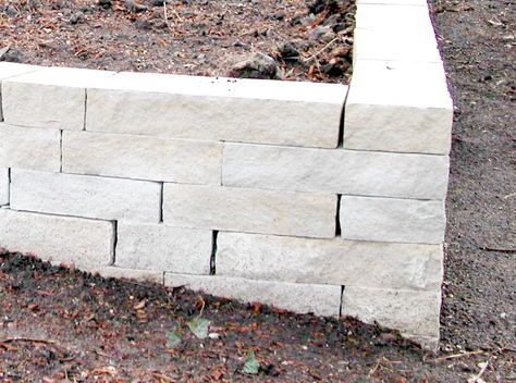 Retaining Wall Pavers, Small Retaining Wall, Stone Flower Beds, Belgard Pavers, Edging Stones, Stone Landscape, Stone Edging, Chicago Brick, Flower Bed Edging