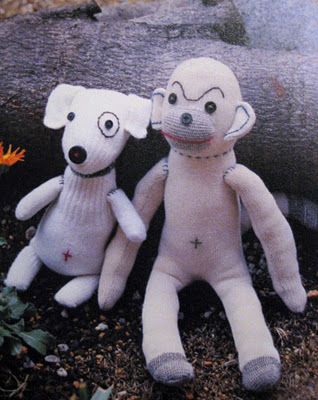 Made the monkey and a dog from the same book but my son's monkey doesn't look mad! Lol. And the dog is a different one. He loooooves them! Sock Monkeys Diy, Sock Monkey Dolls, Sock Monster, Sock Dolls, Softie Pattern, Sock Monkeys, Sock Toys, Crochet Doll Dress, Diy Socks