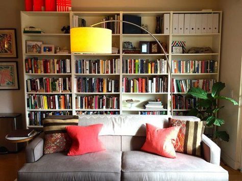 Sofa With Bookcase Behind, Shelves Around Sofa, Bookshelf Behind Couch Ideas, Bookcases Behind Couch, Billy Bookcase Behind Sofa, Library Behind Couch, Bookshelf Wall Behind Couch, Decorating Above Sofa, Shelving Above Sofa