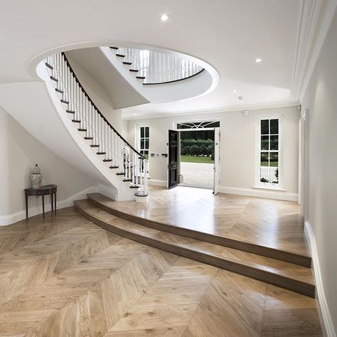 What do you think about this chevron flooring in this impressive hallway? #hall #hallway #stairs #staircase #door #floor #wood #chevron #window #woodwork #finewood #bespokejoinery #joinery #bespokefurniture #design #interior #interiordesign #architecture #home #house #luxe #luxurylife #luxuryinteriors #interior4all #hayburn #hayburnco Sweeping Staircase, Black Front Door, Floor Wood, Floor Door, Herringbone Floor, Curved Staircase, Entry Hallway, Style Goals, Luxury Kitchen Design