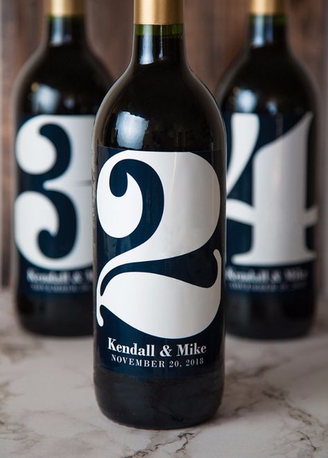 wine bottles with table numbers Unique Wine Bottles, Wine Bottle Table, Wine Wedding Favors, Floating Candles Wedding, Diy Table Numbers, Wedding Entourage, Wedding Favor Table, Wedding Wine Bottles, Creative Wedding Favors