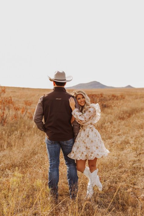 Western Couple Shoot for Engagements | Engagement photo poses | Texas Photographer. Watch as these love birds twirl under the stars, their western outfits adding a touch of cowboy charm to their intimate moments. Discover unique engagement photo shoot ideas, western couple look, modern country engagement photos and spring engagement photos. Book Krista to capture your western Texas engagement session at kristafrancisphotos.com. Cute Couple Western Pictures, Fall Western Photoshoot Couple, Engagement Photos Rustic Ideas, Boho Country Engagement Photos, Cute Country Engagement Pictures, Fall Engagement Pictures Western, Modern Western Photoshoot, Engagement Photos Tennessee, Western Fall Engagement Pictures