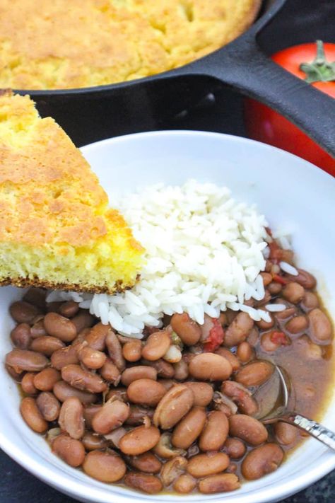 Pinto beans and rice in bowl with side of cornbread Southern Rice, Southern Pinto Beans, Southern Pinto Beans Recipe, Pinto Beans And Rice, Beans Recipe Crockpot, Beans And Cornbread, Pinto Bean Recipes, Rice And Beans Recipe, Cooking Dried Beans