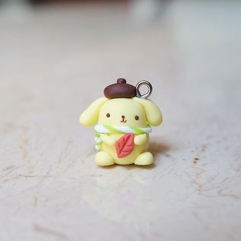 Fall-themed Pompompurin I made a while back! 😊☘🍂🍁🍃☘🍂🍁🍃 #polymerclay #claycharms #clay #polymerclaycharms #clayart #handmade #diy #kawaii #cute #crafts #pompompurin #sanrio #fall #autumn #sweatherweather #anime Clay Pompompurin, Sanrio Fall, Sanrio Crafts, Fimo Kawaii, Clay Keychain, Kawaii Diy, Clay Diy Projects, Polymer Clay Sculptures, Resin Clay