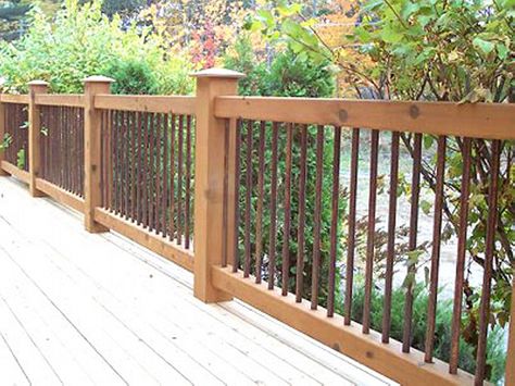 Cedar Deck Railing with Iron View more Deck Railing Ideas http://awoodrailing.com/2014/11/16/100s-of-deck-railing-ideas-designs/ Deck Railings Ideas, Rebar Railing, Porch Railing Ideas, Wood Deck Railing, Timber Frame Porch, Patio Railing, Deck Railing Ideas, Deck Railing Design, Cabin Deck