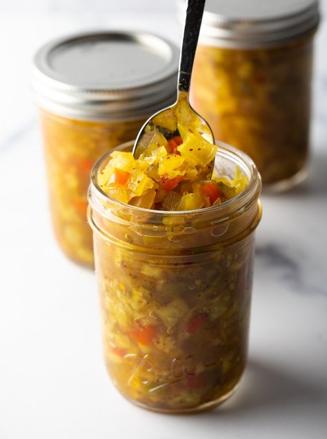 Glass jar of southern chow chow. The lid is off and to the right side, a metal spoon is in the jar showing a scoop to camera. Southern Chow Chow Recipe, Chow Chow Canning Recipe, Southern Chow Chow, Pioneer Kitchen, Chow Chow Relish, Chow Chow Recipe, Chow Recipe, Relish Recipe, Gourmet Grilling