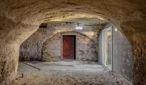 This historic Minnesota home for sale comes with caves – Twin Cities Historic Homes For Sale, Carriage Doors, Minnesota Home, Pump House, Floating Staircase, Tudor House, Meditation Space, Living And Dining Room, Old House Dreams