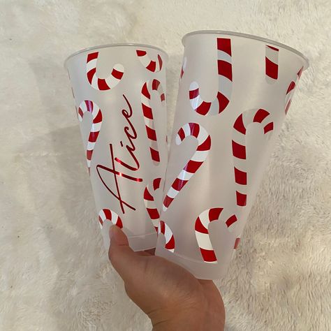 This item is not dishwasher safe, please hand wash only! This cup can only be used with cold drinks. Do not soak or scrub the vinyl.  Leave your name, chosen font and vinyl colour in the customisation box. Comes with straw and lid. Any questions drop me a message! Happy Shopping x SVG by MilkMilkSugar Starbucks Christmas Cups, Christmas Eve Crate, Christmas Starbucks, Starbucks Cup Design, Christmas Cups, Vinyl Tumblers, Creative Christmas Trees, Starbucks Christmas, Candy Cane Christmas