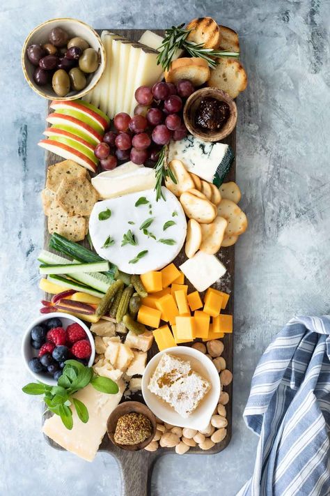 While butter boards might be trending, timeless Cheese Board parties will never go out of style. Learn how to build a cheese board, how much cheese per person, and other cheese tips to serve a spread that’s gourmet and gorgeous all at once. Vegetable Boards, Board Parties, Butter Boards, Perfect Cheese Board, Cheese Trays, Charcuterie Inspiration, Fruit Preserves, Copycat Restaurant Recipes, Charcuterie And Cheese Board