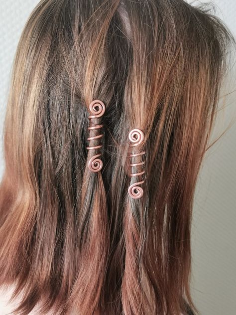 Copper hair spiral, wire coils, hair accessories, jewelry, a pair of spiral copper, hair beads, hair twister, spiral hair wrap, gift for girls Set of two hammered copper hair spirals. A pair of hair spirals handmade of copper. Really easy to apply in the hair and stays in for a long time. Each pair is made separately. It is hand polish to gloss. The spiral on this hair accessory represents the ancient symbol of a grass snake. The snake symbolizes health, vitality and wisdom. The Pin's lenght is Hair Coils Jewelry, How To Make Hair Spirals, Hair Wire Accessories, Hair Spirals Accessories, Copper Hair Accessories, Diy Hair Spirals, Wire Hair Wrap, Hair Spirals, Grass Snake