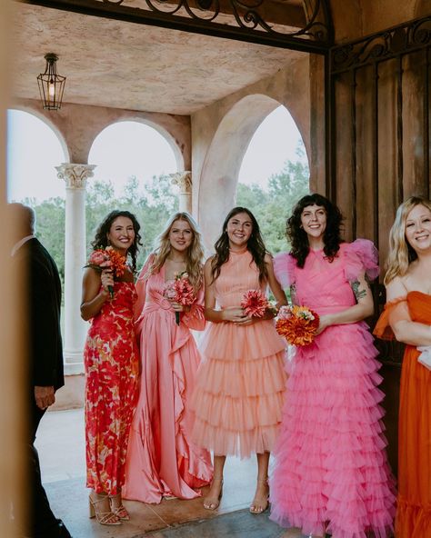 Bridemaids Colorful Dresses, Fun Bridesmaids Dresses, Groomsmen With Mismatched Bridesmaids, Mismatched Bright Bridesmaid Dresses, Light Pink And Orange Bridesmaid Dresses, Bridesmaids Pick Their Own Dress, Red Pink Bridesmaid Dresses, Maximalist Bridesmaid Dresses, Bright Floral Bridesmaid Dresses