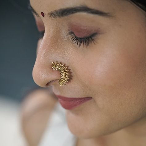 This is a portrayal of pure grace✨ These beautiful naths are handmade in 92.5 silver with gold plating. The entire range of gold plated silver naths look absolutely stunning and are very hard to resist😍 Shop them now at www.aadyaa.com 🔎 Gold plated silver: https://aadyaa.com/collections/gold-plated-silver For WhatsApp orders ping us at 7219285508 #aadyaa #silverjewellery #silver #handmade #handmadejewellery #jewellery #goldplated #goldplatedsilverjewelry #nath #exquisite #graceful #beautiul Gold Nath, Nath Nose Ring, Cultural Events, Traditional Attire, Filigree Design, Unique Handmade Jewelry, Traditional Indian, Silver Filigree, Pure Gold