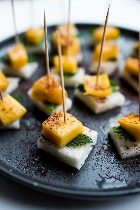 Jicama Mint Mango Bites Appetizer are the perfect spring or summer appetizer. Light and healthy, but so flavorful! #jicama #mango #appetizers Mexican Passed Appetizers, Happy Hour Bites, Mexican Appetizers For Wedding, Mexican Canapes Appetizers, Island Appetizers, Mango Appetizer, Jicama Recipes, Jicama Recipe, Passed Appetizers