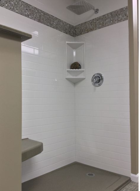 White subway tile looking shower wall panels with a mosaic border | Innovate Building Solutions Tile Above Shower Surround, Shower Ceiling Tile, Fiberglass Shower Stalls, Bathroom Panels, Standing Pantry, Mosaic Border, Spare Bathroom, Lakehouse Ideas, Bathroom Paneling