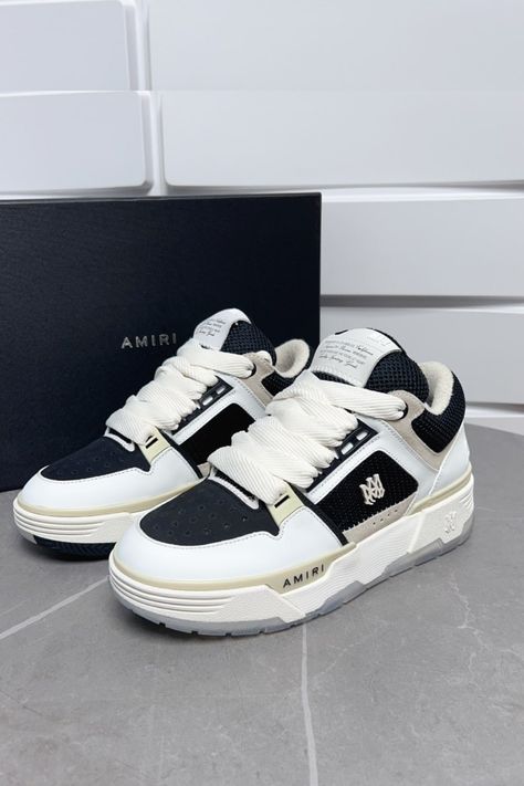 Embrace contemporary style with Amiri Black & White Sneakers. These Black & White shoes seamlessly blend classic elegance with modern flair, featuring a striking contrast of colors. Crafted with premium materials, they offer comfort and durability for everyday wear. Elevate your ensemble with the timeless sophistication of Amiri Black & White Sneakers, a versatile choice for any occasion. Amiri Shoes, Amiri Sneakers, Mike Amiri, Amiri Jeans, Black White Sneakers, Black White Shoes, Branded Shoes, Drip Outfit Men, Black And White Sneakers